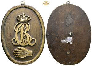 Politiskilt med Christian IX's kronede monogram over politiets hånd med øje