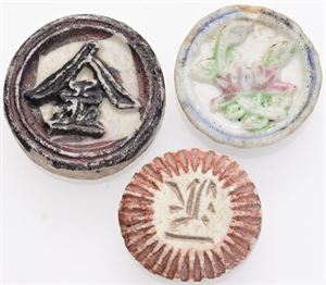 Porcelain coins / tokens. (3)