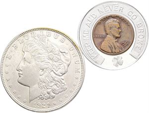 Dollar 1921 D; good luck token. (2)