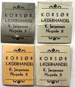 Korsør Læderhandel, frimærkepenge, fire forskellige