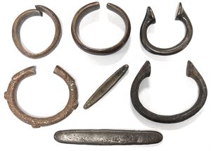 Manilla rings, 'canoe money', 'tiger tongue'. (7)