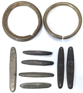 Manilla rings, 'canoe money', 'tiger tongue'. (9)