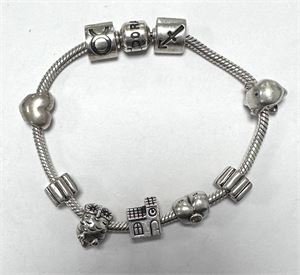 Pandora armlænke med 7 charms og to klemmeled i Sterlingsølv, vægt 41,46 g